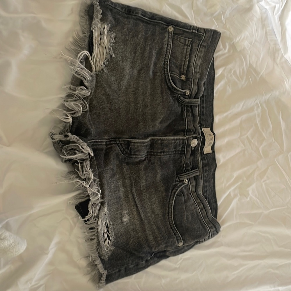 We the Free light black cut off denim shorts size 31.